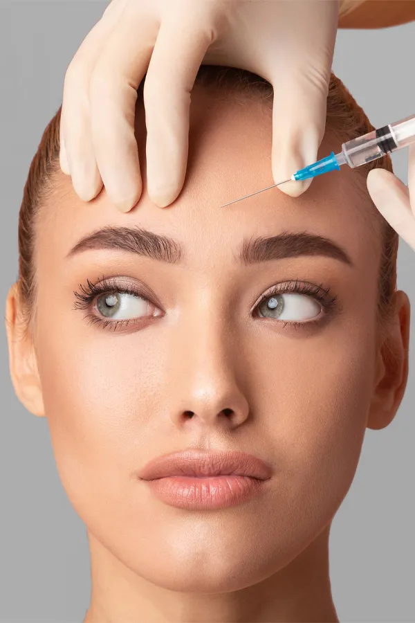 Botox-Treatment Close up of a woman with receiving a Botox injection in her brow from Thrive Family Practice & Med Spa in Statesboro.