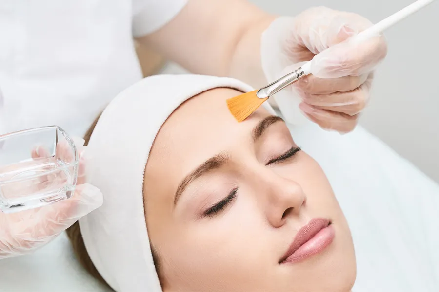 VI-Chemical-Peel-Clinic A woman gets a chemical peel. Get VI chemical peels from Thrive Family Practice & Med Spa in Statesboro.