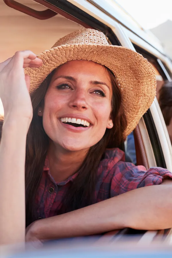 VI-Chemical-Peel-Treatment A beautiful woman in a sunhat leans out a car window. Get VI chemical peels from Thrive Family Practice & Med Spa in Statesboro.